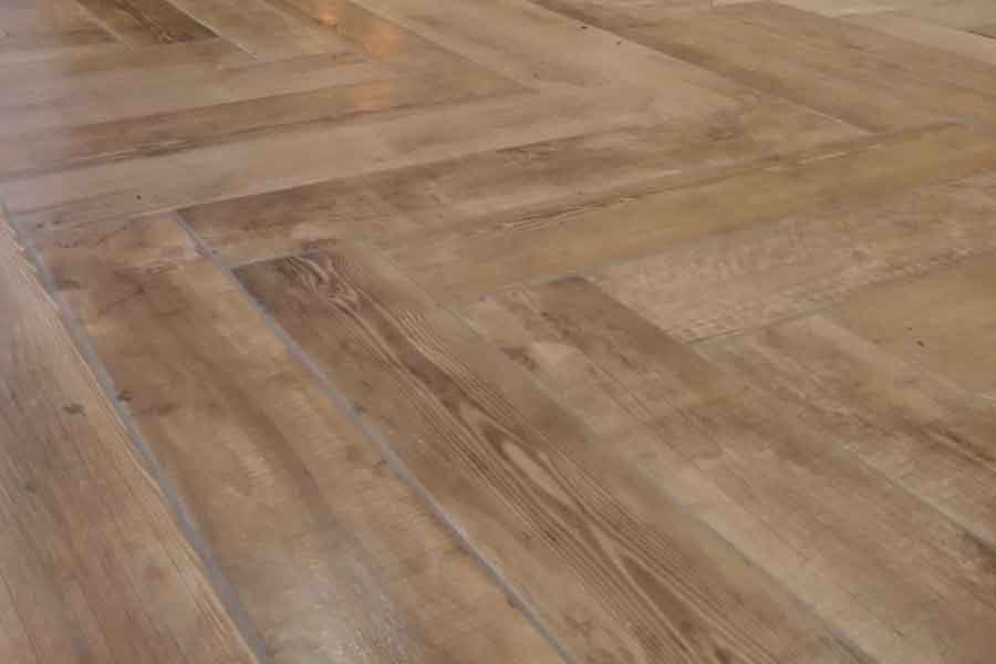 Wood effect tile floor herringbone